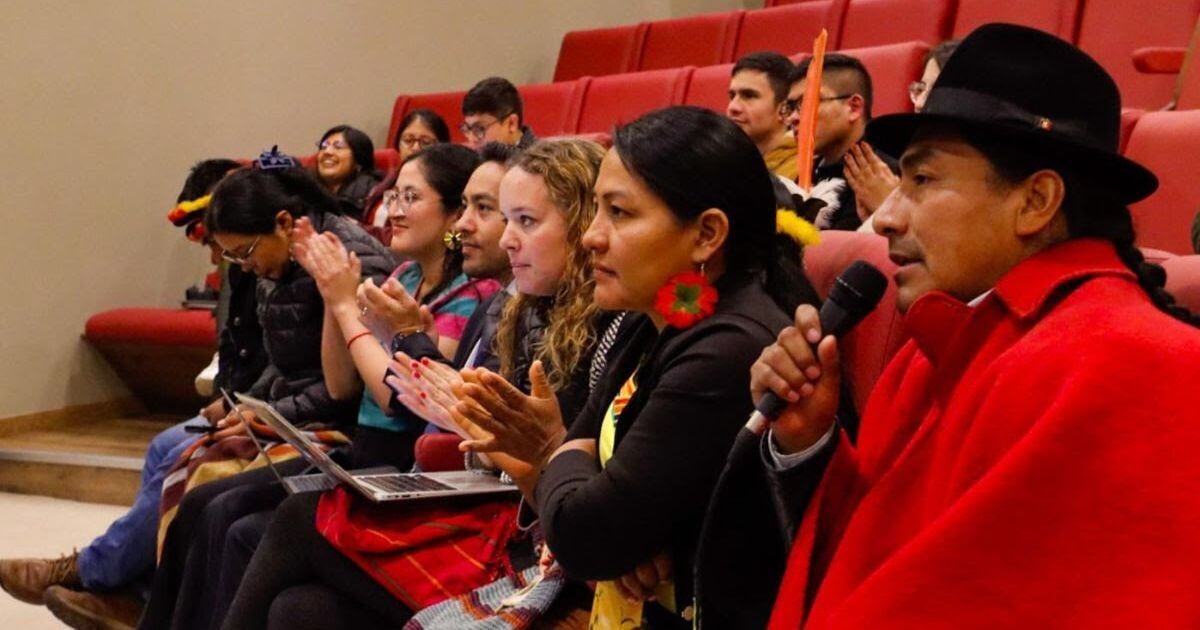 Indigenous representative speaking into a microphone at digenous Peoples Tagaeri and Taromenane v. Ecuador Court Case