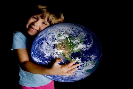 child holding globe